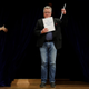 Germany’s Fritz Strack accepting his Ig Nobel award in psychology for discovering that holding a pen in one’s mouth makes them smile—and for then later disproving his own research.